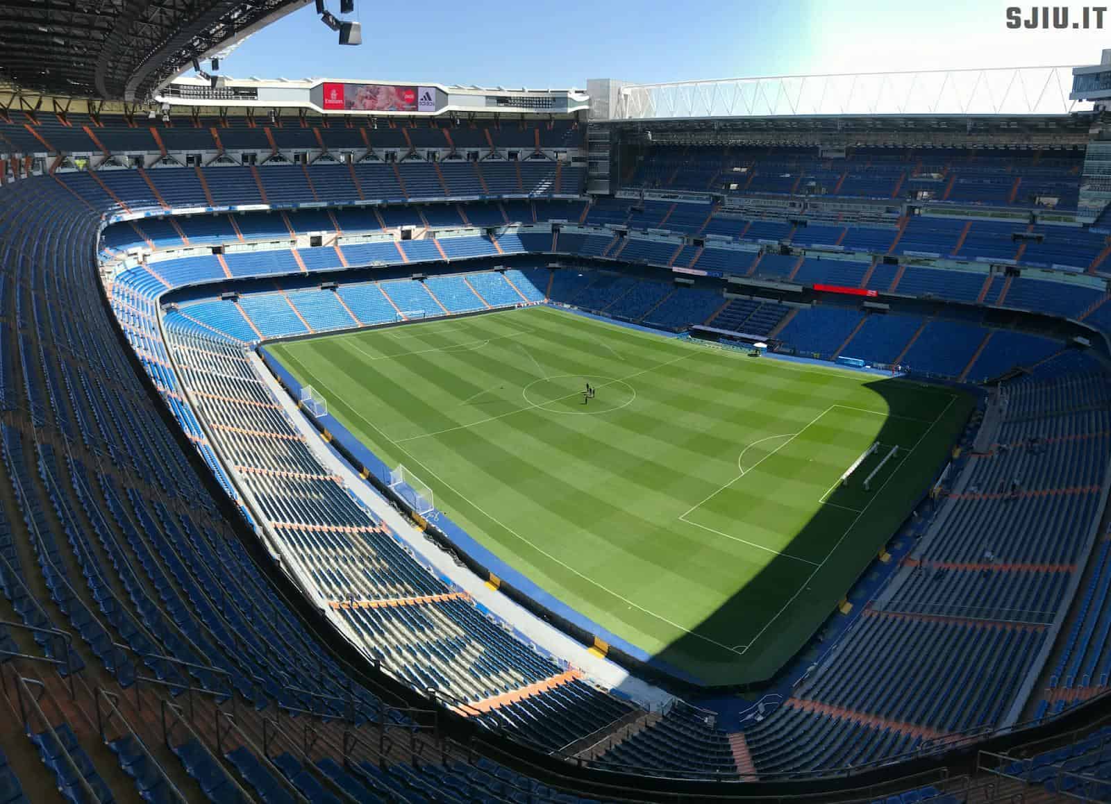 High-angle view of the empty Santiago Bernabeu Stadium on a sunny day in Madrid, Spain.